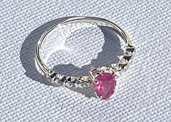 Ruby and white topaz side